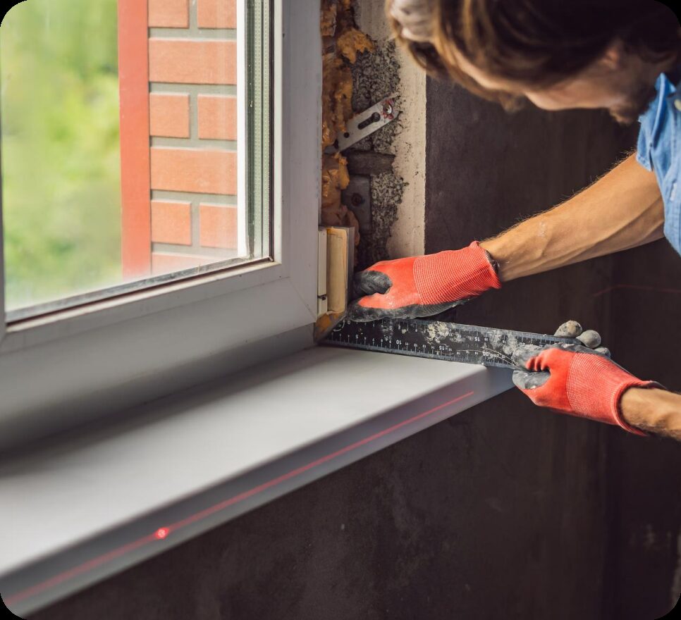 Capital Glass installer fitting a new window